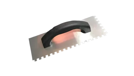 Close-up of a Home Pride notched steel trowel, showing the comfortable orange and gray ergonomic handle and 1/4 inch square notches.