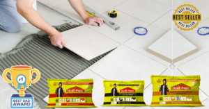 Best tile adhesive being applied by an Indian mason for floor tile installation